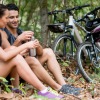 a couple riding bikes