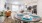 a dining room table with plates and cups on it