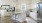 a kitchen with white cabinets