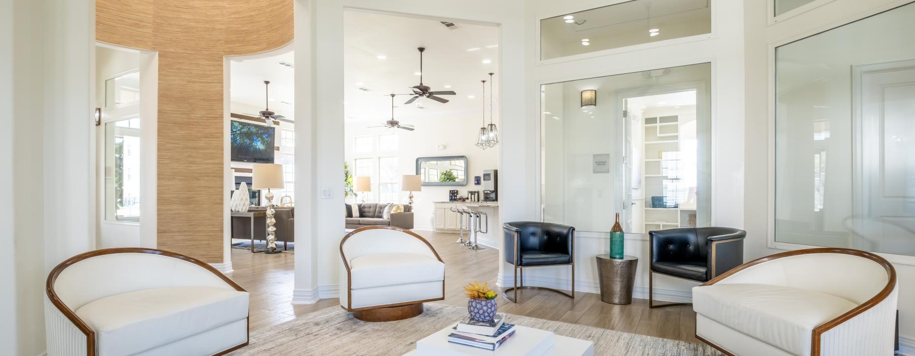 a spacious room with white furniture
